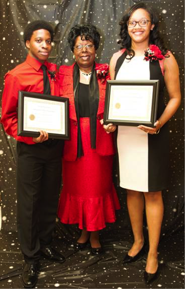 Scholarship Winners, L to R Marcus Williams, Mrs. Cassandra Reese,Presenter and Miss Jatava Wells.