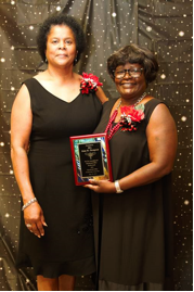 L to R Mrs. Bonnie Gholson, presente and Mrs. Ruby Thompson, Educational Office Professional of Year